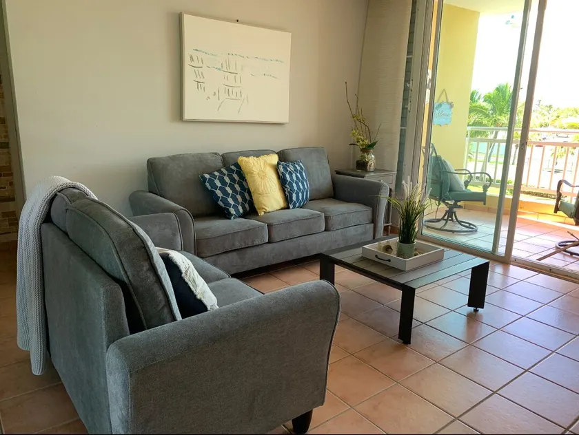 Sunny 2-bedroom condo by the beach\n - Image 1