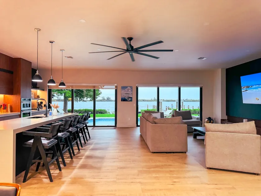 Riverfront Getaway w/ Pool, Dock & Sunset Views - Image 1
