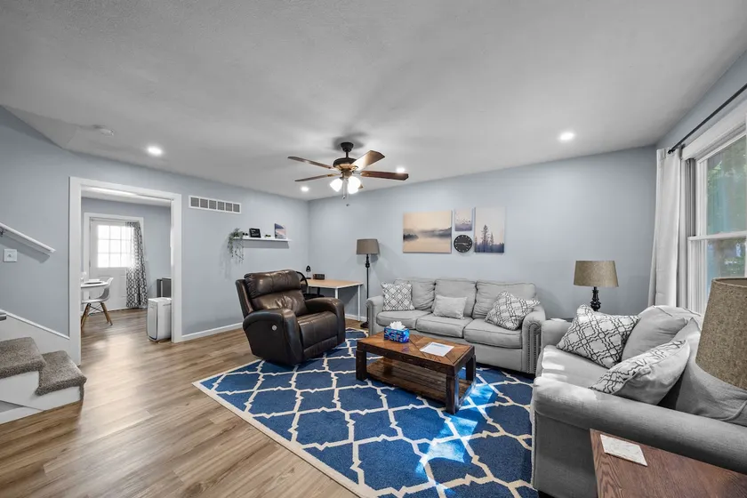 Clean, spacious, and fully renovated townhouse with modern charm and comfort. - Image 1