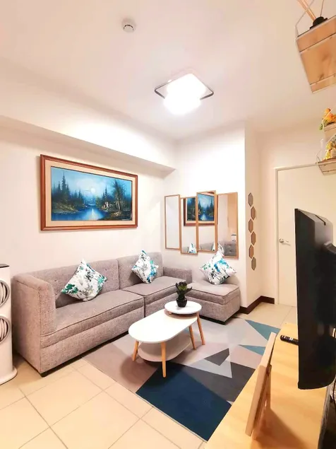 Cozy staycation in QC | 2BR | Wi-Fi | Parking - Image 1