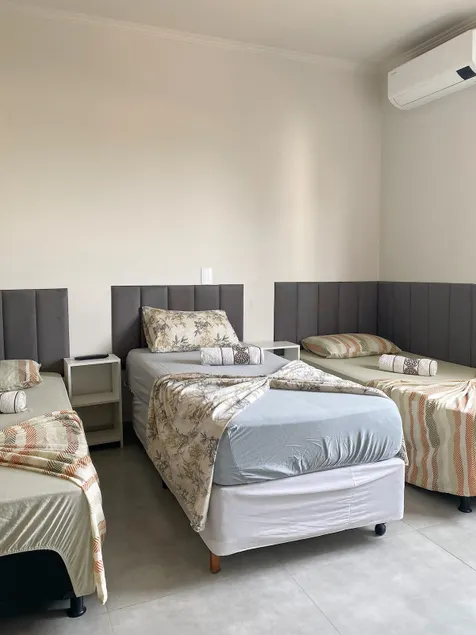 Pôr Do Sol Varginha Guesthouse, Triple Suite - Image 1