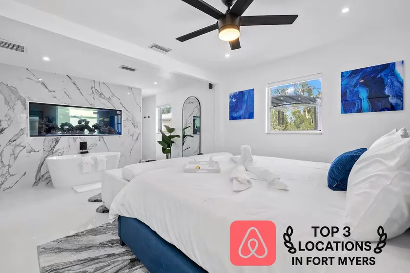 Luxury family friendly WATERFRONT home with a POOL, PLAYGROUND, FIREPIT & BEACH  - Image 1