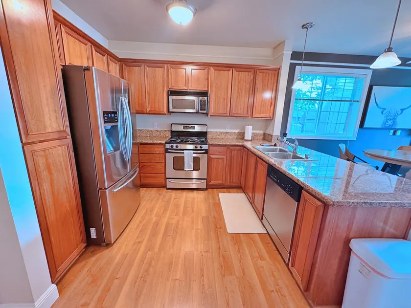 Modern Gated Condo + Private Garage + Workspace - Image 1