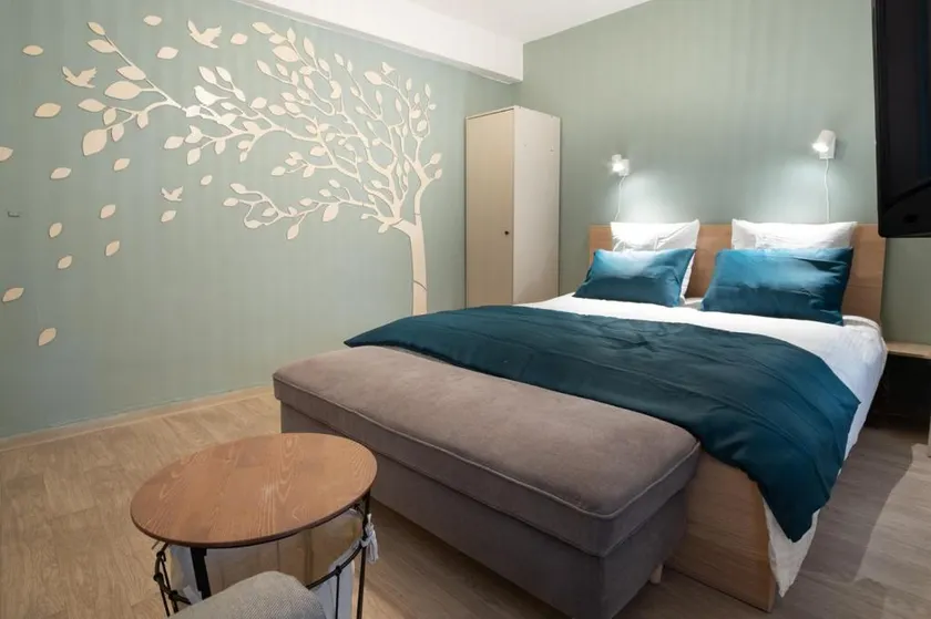 Emerald Cocoon – Comfort, Terrace and Activities - Image 1