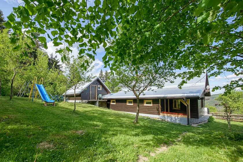Wooden house in beautiful nature with a hot tub - Image 1