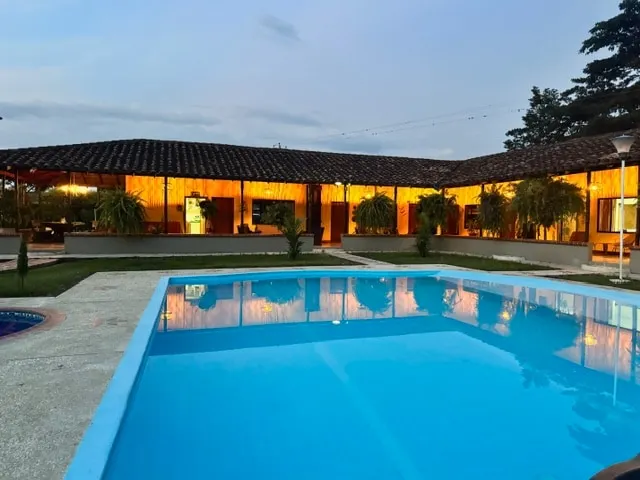 A fully-equipped vacation home with a swimming pool and river - Image 1