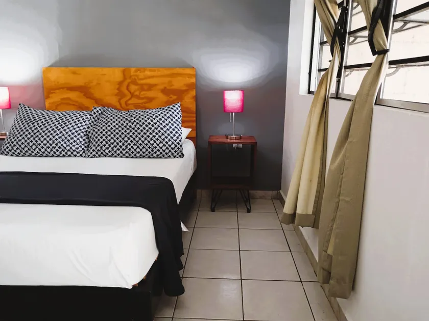 Simple Room · AC · WiFi · Practical Stay - Image 1