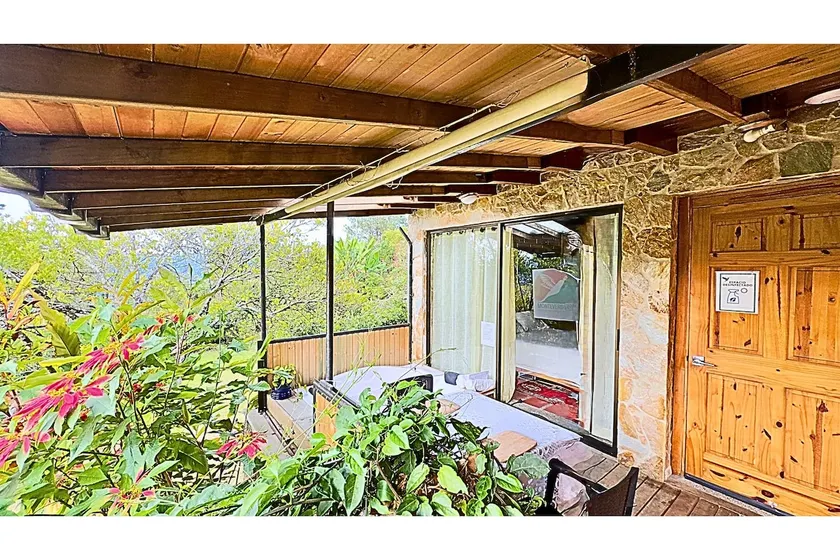 Jacuzzi on a covered deck with mountain views - Image 1