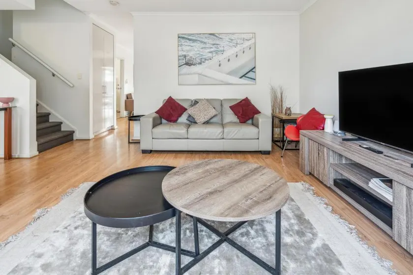 Spacious Family 3BR Townhouse by Park • Free WiFi & Parking Close CBD - Image 1