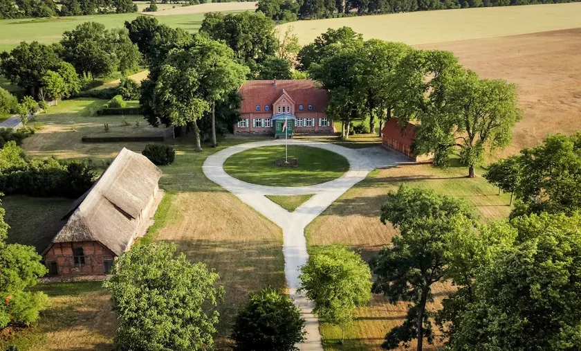 Forest farm in secluded location with fenced 16,000m² park, sauna, fireplace, hot tub in West Mecklenburg - Image 1