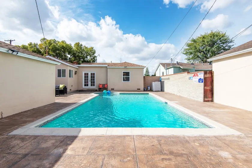Spacious 4BR/3BA Haven with Pool + Private Patio - Image 1