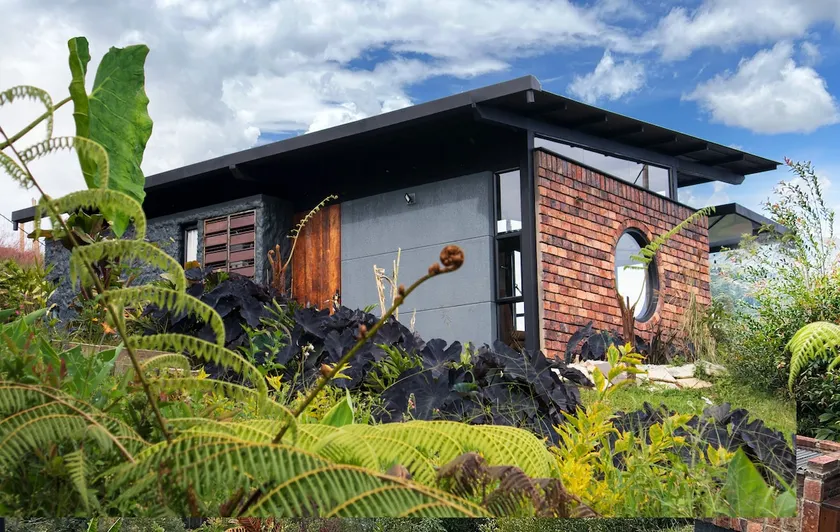 Modern cabin with lake and stone view - Image 1
