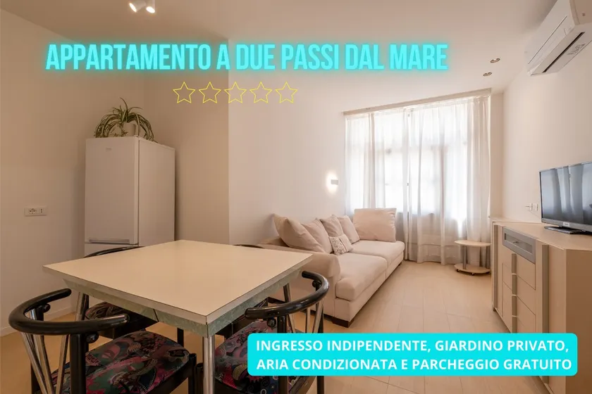 Waterfront apartment with garden and parking - Image 1