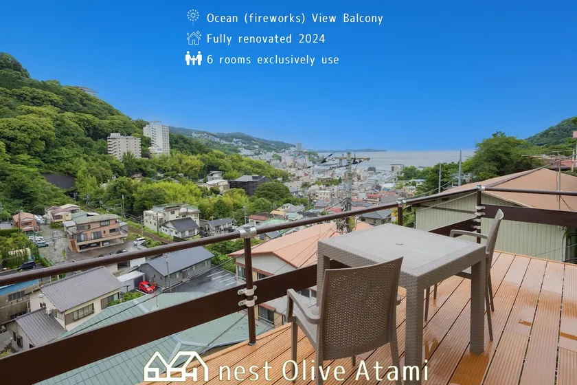 View of the sea, fireworks, and city. Entire 3 bedroom small hotel for rent to one group - Image 1
