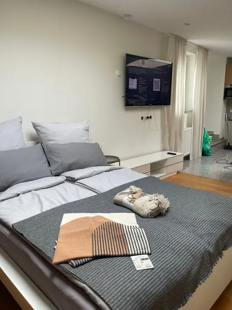 Cozy apartment on the first floor with bus stop in front of the door - Image 1