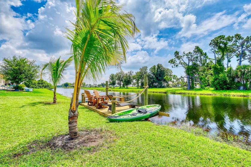 Canalfront Retreat | Dockside Fishing Near Ocean - Image 1