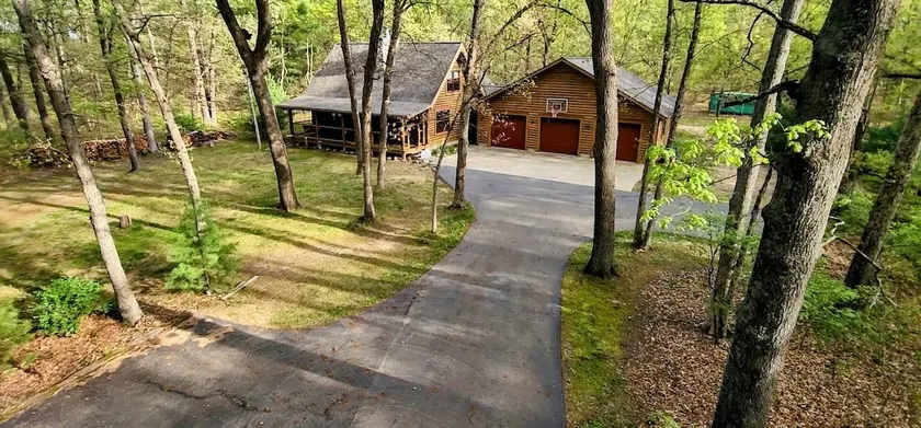 Modern Log Home + Container in Middle of Forest - Image 1