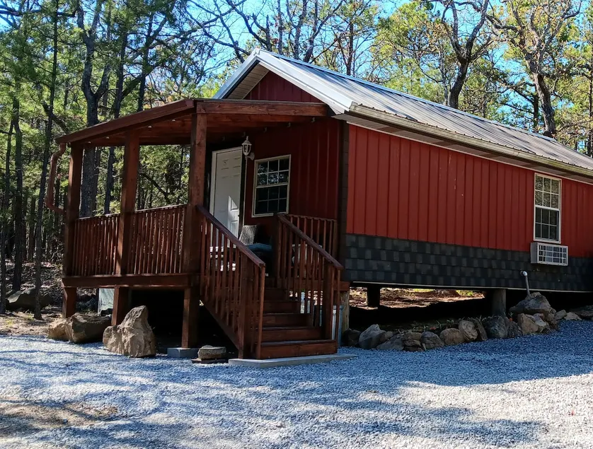Little red cabin in the peaceful forest - Image 1