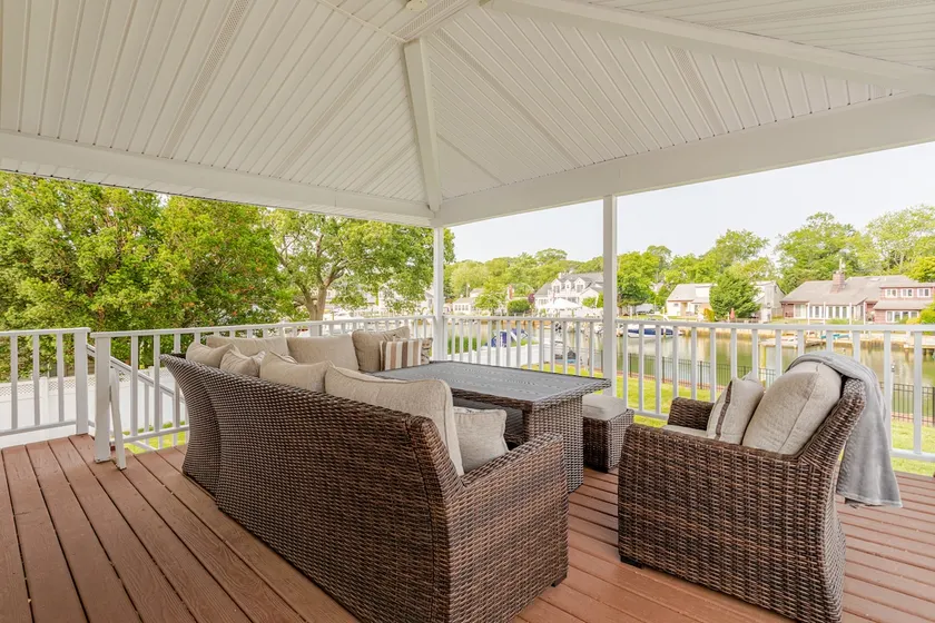 Waterfront Retreat with Spa & Deck - Image 1