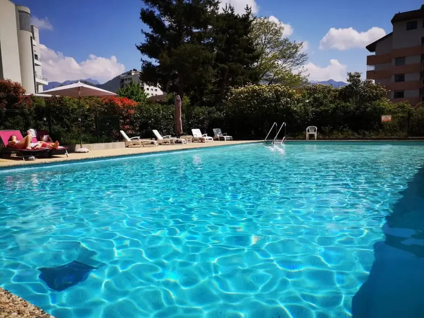 Charming accommodation with balcony, pool and bicycles - Image 1