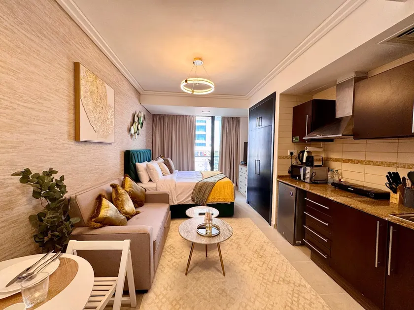 Cosmos Living Sleek and Stylish Studio with Balcony - Image 1