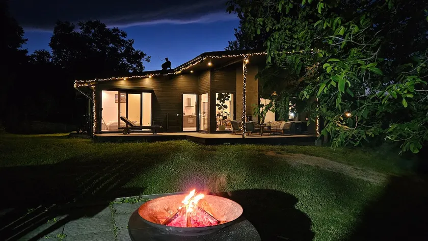 Black Walnut House with indoor outdoor fireplace - Image 1