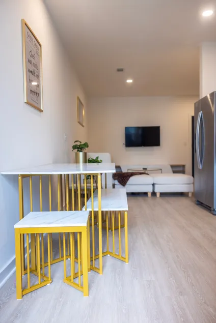 Cozy 1BR | Private Balcony, Gym, Pool & Workspace - Image 1