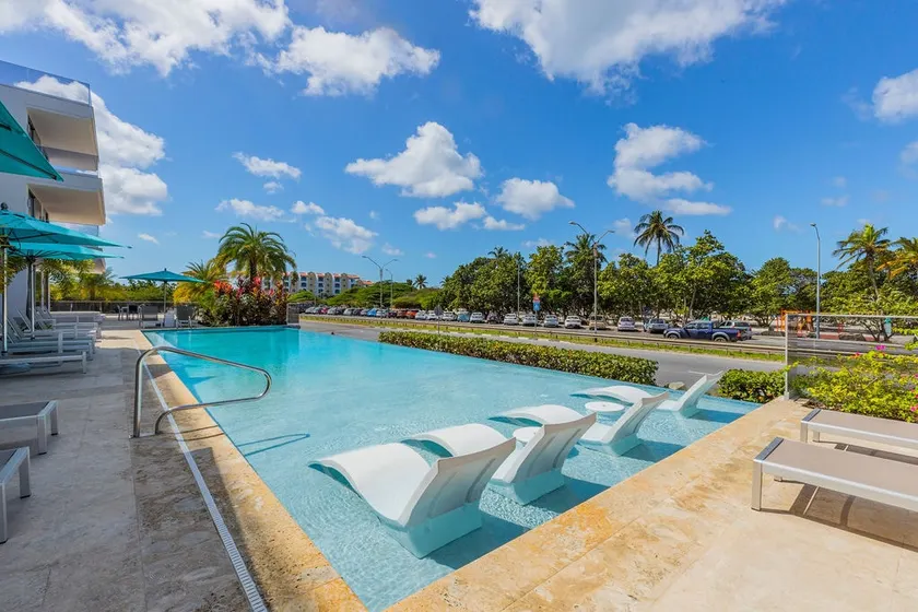 Eagle Beach Modern 2BR2BA Beachfront Condo w/ Pool - Image 1