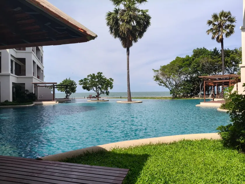 Serene beachfront escape with sea & mountain view - Image 1