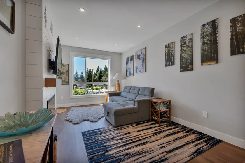 One-Bedroom Condo with Balcony and Mountain View - Image 1