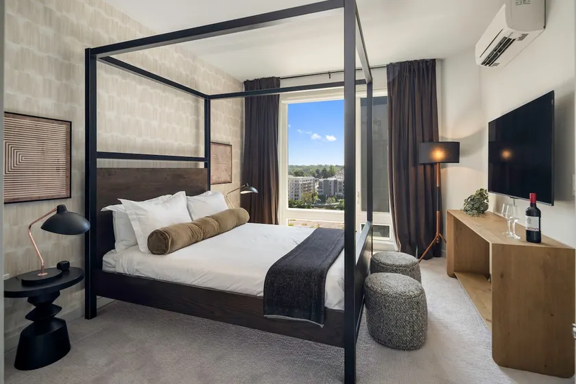 Designer 1BR | Luxe Amenities, Gym, Parking - Image 1