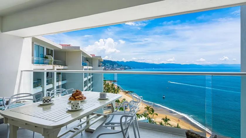 Stylish Oceanfront 2BR - Balcony with Sunset Views, Pools, Beach & Gyms - Image 1