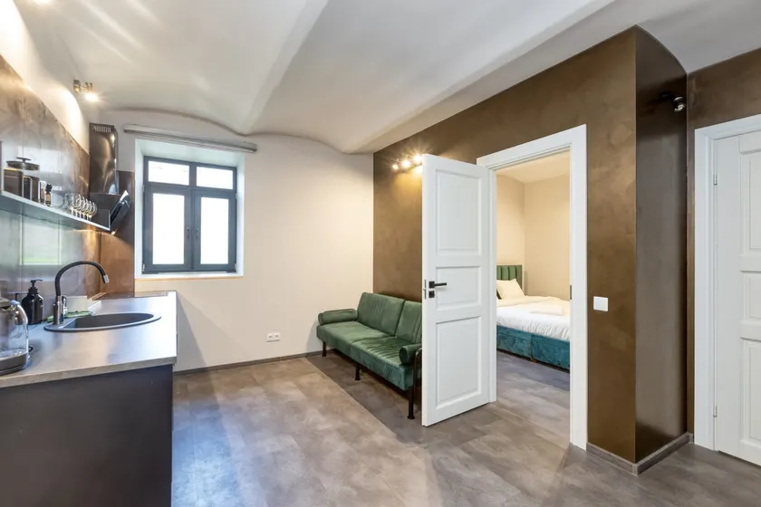 Stylish Escape with 50"TV - Free Parking & Sauna - Image 1