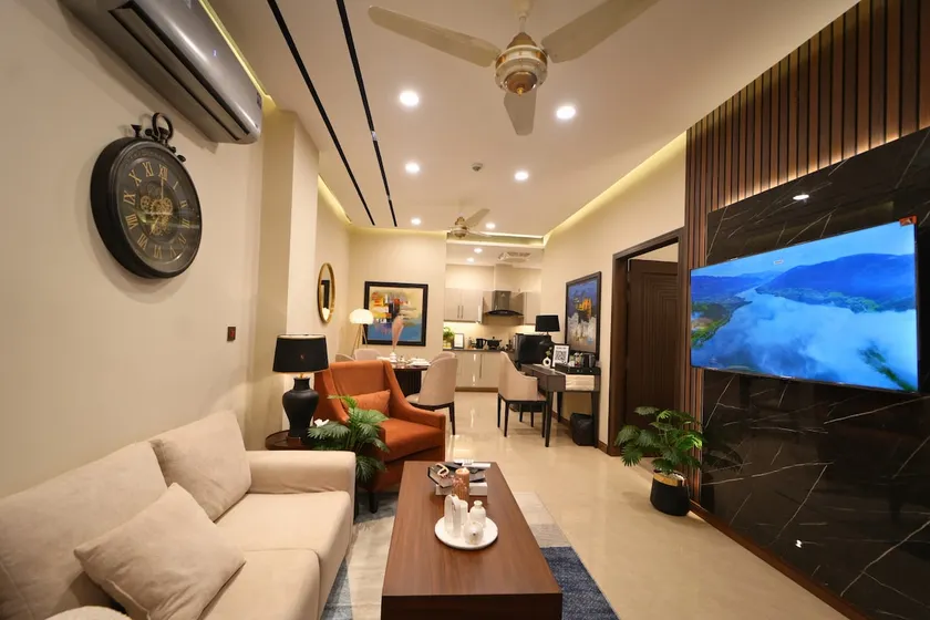 Cozy 1BR| Infinity Pool IWorkspace+Wifi+Parking. - Image 1