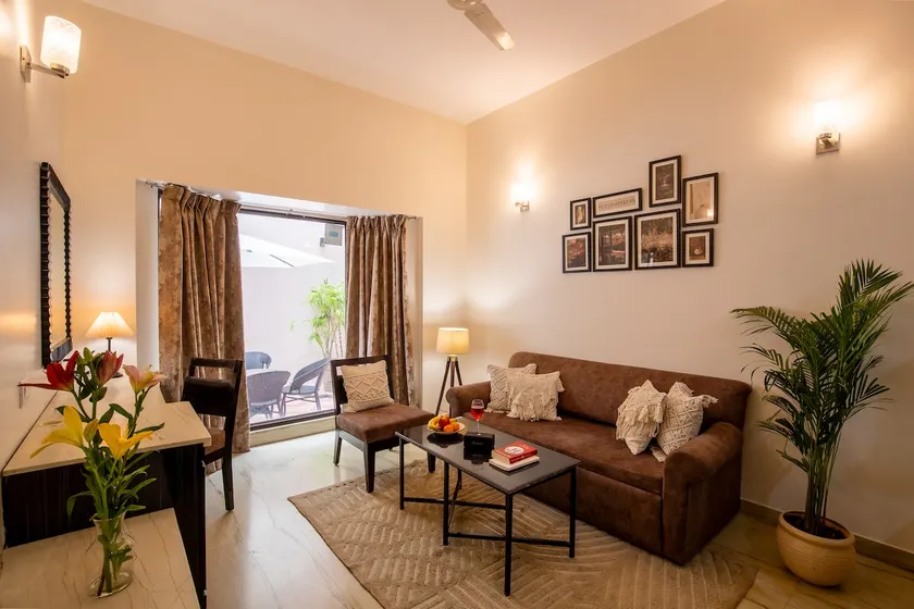 Elegant 1BHK Apartment w/ Common Sitting Area - Image 1