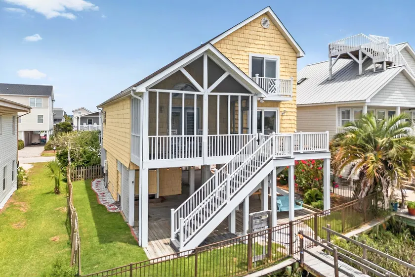 Waterfront Escape with Dock, Fenced Yard & Sunsets - Image 1
