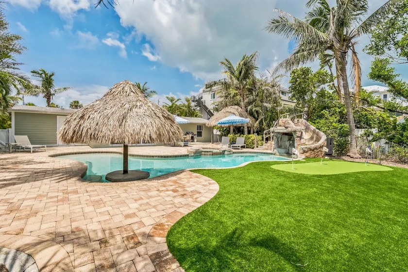 Swim up Tiki~Canal~Waterslide Putt Putt! TIKI HUT - Image 1