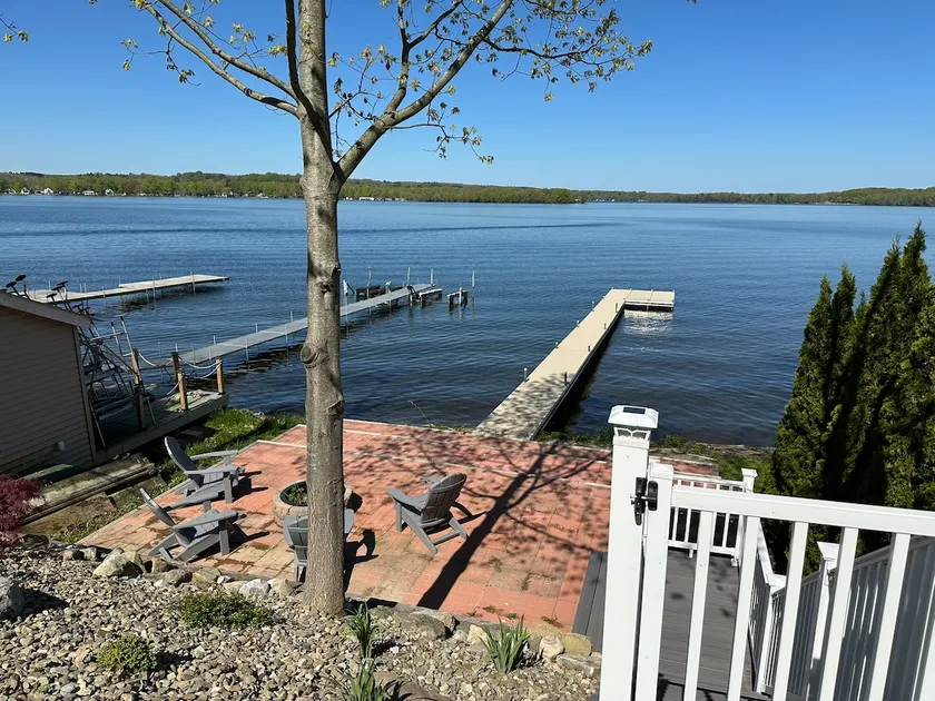 Private lakeside patio with firepit & dock. - Image 1