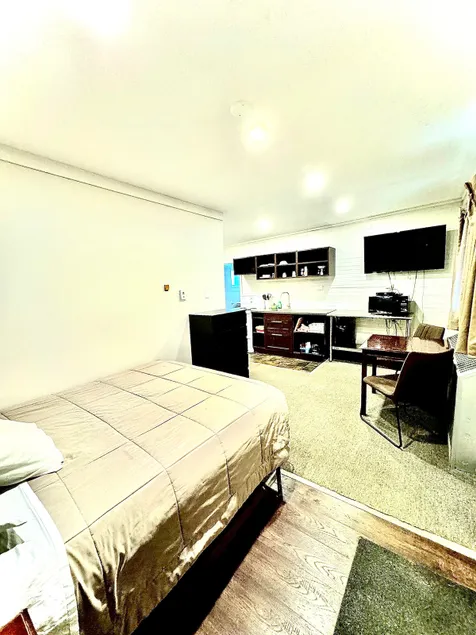 Modern Motel Suite Oasis - Image 1