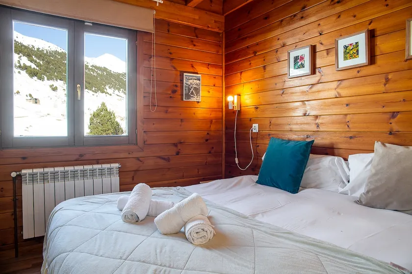 Cabin by the river and mountain - Image 1