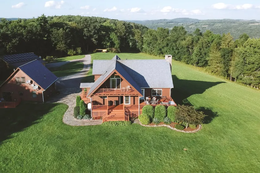 Mountain House + Guest Cottage on 65-acre property - Image 1