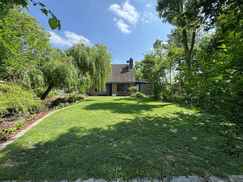 Vacation home with enclosed garden near the beach and lake. - Image 1