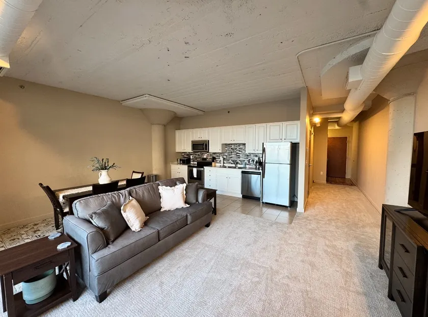 NEW! First Floor Downtown Condo! - Image 1