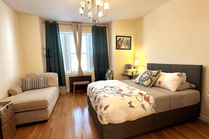 Manhattan Marvel: 2BR Oasis in West New York, NJ - Image 1