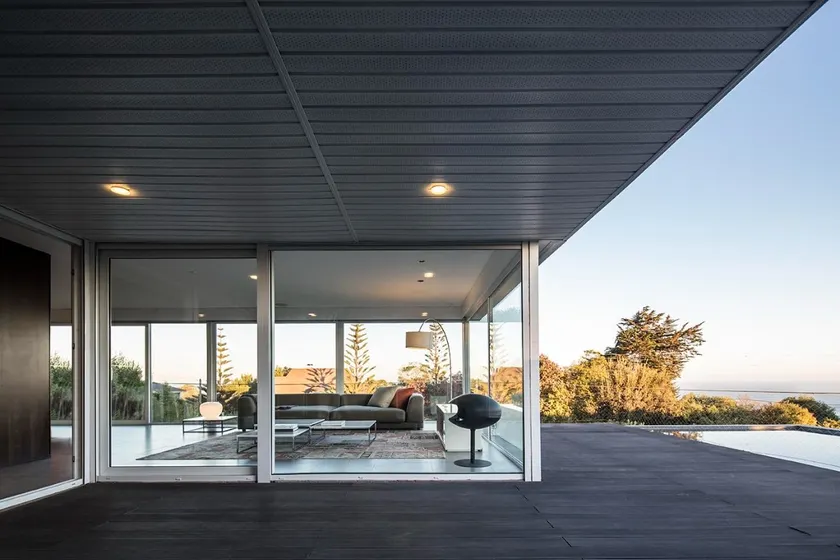 Modern house with ocean views and a large garden. - Image 1