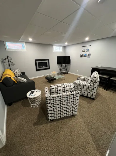 Cozy, air conditioned 2 bedroom basement suite. - Image 1