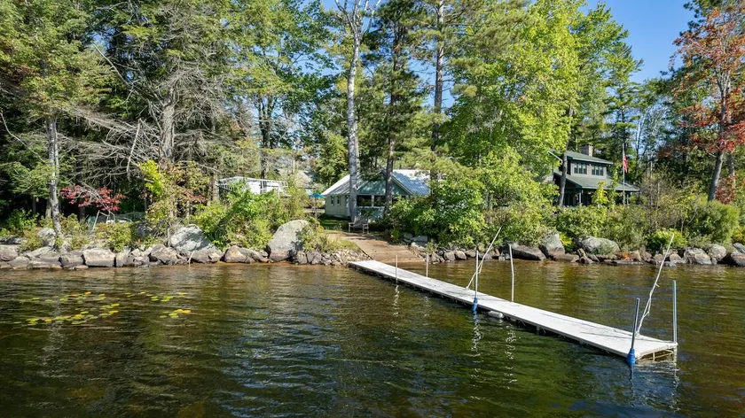 Whispering Pines Lakeside Cabin - Image 1