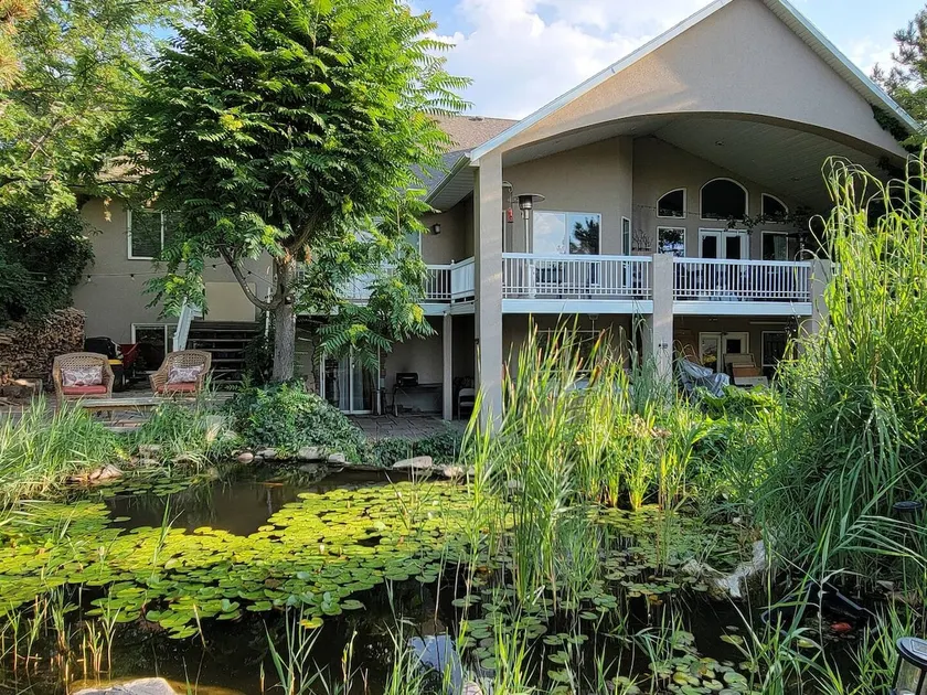 Exquisite house with chickens and koi pond - Image 1