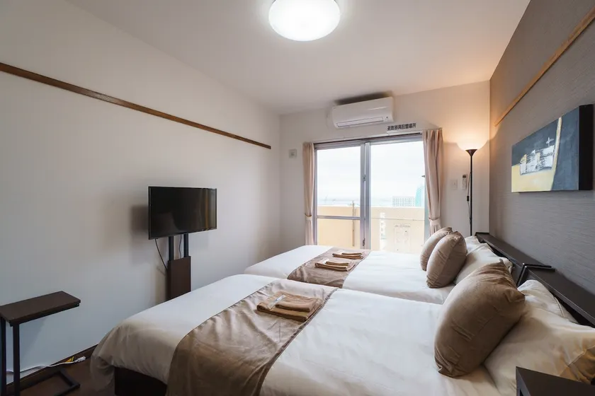6 min drive from Naha Airport | Brand new serviced apartment | Free high-speed Wi-Fi | Exclusive washer and dryer - Image 1
