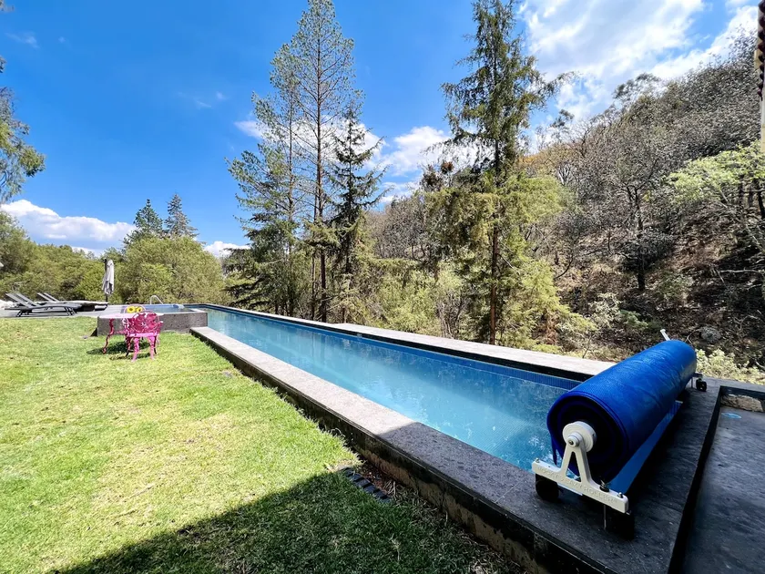 Cabin in the Woods with a Pool on a Farm - Image 1